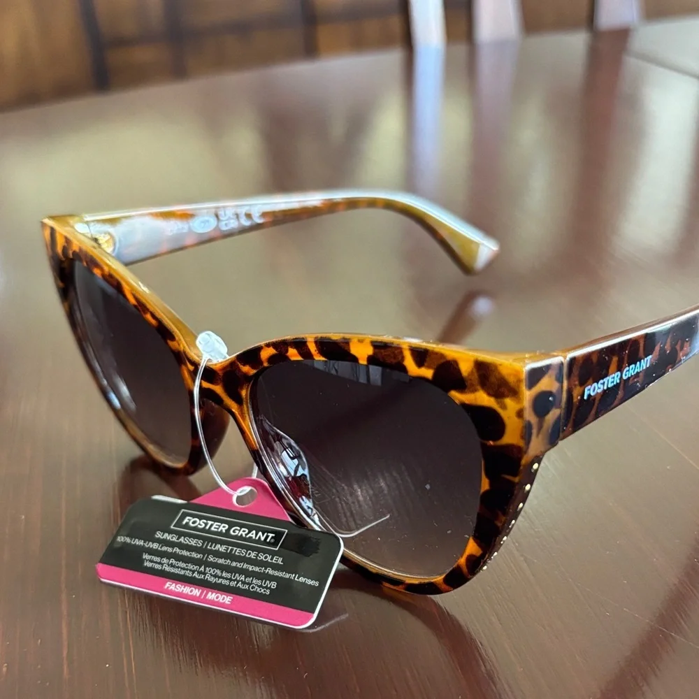Foster Grant 100% UVA-UVB protection leopard print, gold tone beaded frame edge